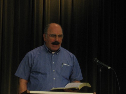 Evangelist Dr. Wayne Hines makes a point to Lifeline
